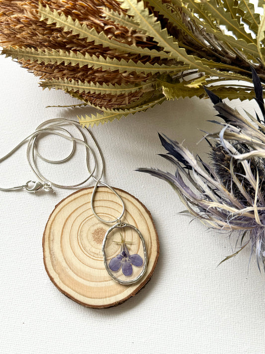 Purple flower necklace oval